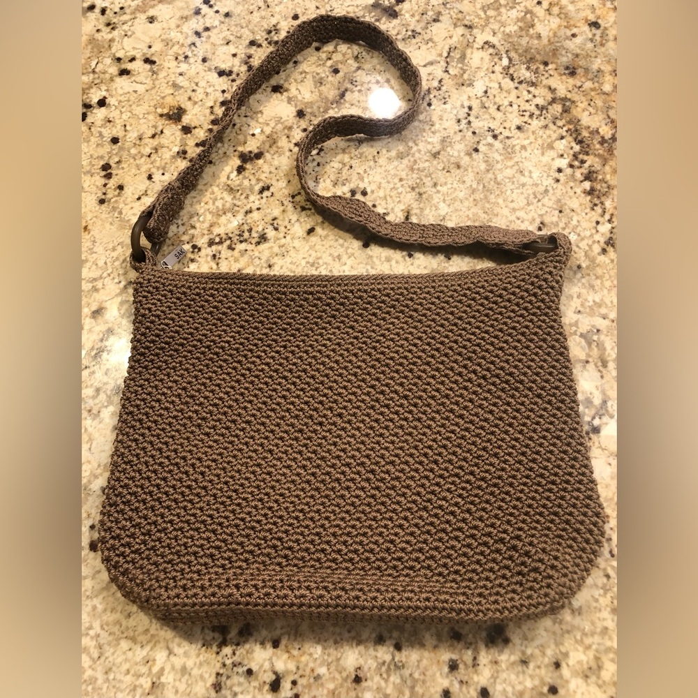 THE SAK beautiful minimalist all crocheted bag. Looks new. Not sure. Excellent